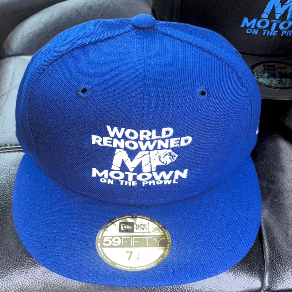 Blue baseball cap with 'World Renowned Motown' embroidery.