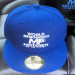 Blue baseball cap with 'World Renowned Motown' embroidery.