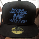 Black Motown cap with blue text and logo.