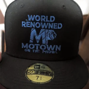 Black Motown cap with blue text and logo.