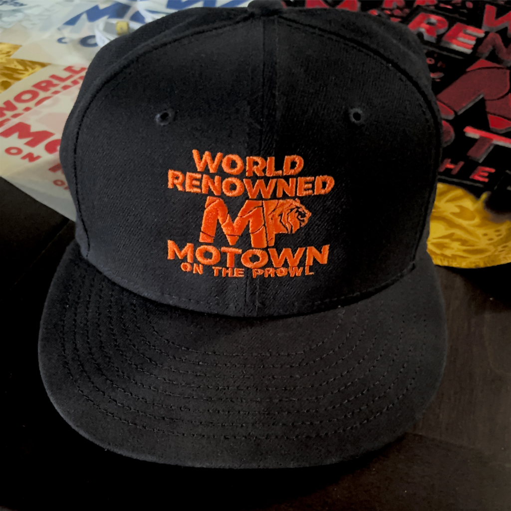 Black cap with orange 'World Renowned Motown' logo.