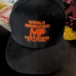 Black cap with orange 'World Renowned Motown' logo.